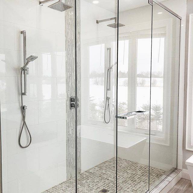 Beautiful washroom with showers and glass doors