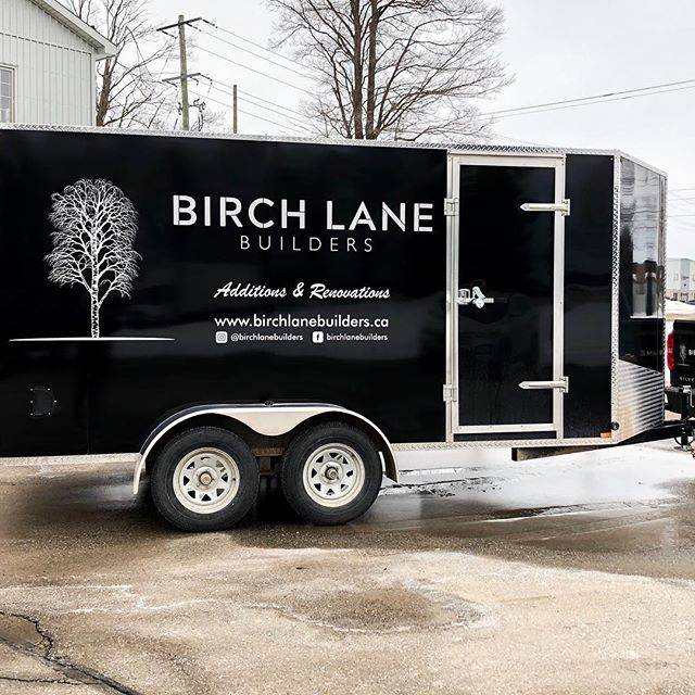 Black Birchlane truck with trailer in service